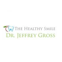 The Healthy Smile Dental Center: Dr. Jeffrey Gross DDS FAGD's Logo