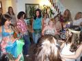 Shamira entertains the party goers at a baby shower with a mini bellydance class.