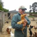Farmer John and one of his chickens