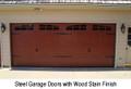 Steel garage doors with wood stain finish