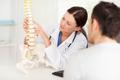 Chiropractor works on spine alignment with a patient in Florence, KY