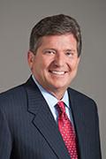 Thomas E. Skains, Chairman, President and Chief Executive Officer