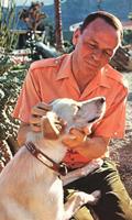 Frank Sinatra and his dog Ringo photographed in his Palm Springs home by John Bryson for the December 14, 1965