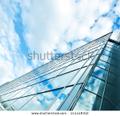 stock-photo-perspective-and-underside-angle-view-to-textured-background-of-modern-glass-building-skyscrapers-114448312