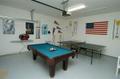 Gamesroom with pool table and ping pong tables
