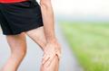Runner leg and muscle pain during running training outdoors