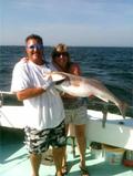 Jon and Linda show off their grouper