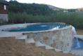 Laurel Pools inground pool built with retaining wall.