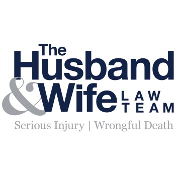 The Husband and Wife Law Team's Logo
