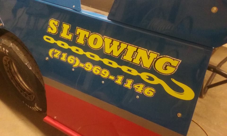 S.L Towing's Logo