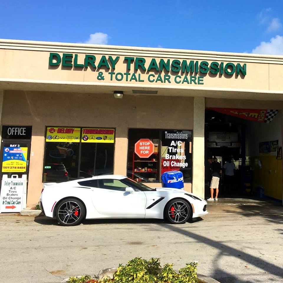 Delray Transmission & Total Car Care's Logo