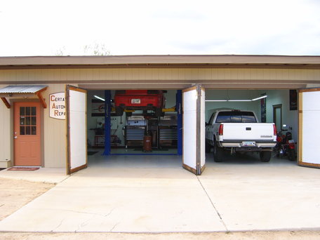 Out front of the Certa's Automobile Repair auto repair shop