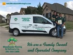 Woodlands Moving and Delivery Co.'s Logo